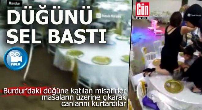 Burdur'da düğün sırasında salonu sel bastı, misafirler masalara çıktı