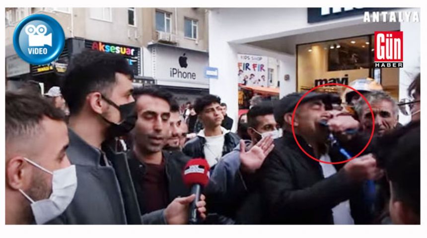 Antalya'da 'Telefonunu çıkart' diyen adamın ağzına telefon soktular