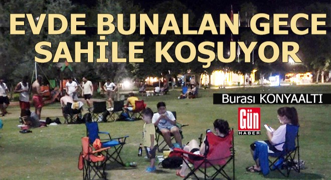 Evde bunalan gece Konyaaltı Sahili'ne koşuyor