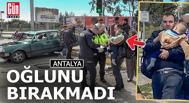 Kazada yaralanan baba, korkan oğlunu kucağından bırakmadı