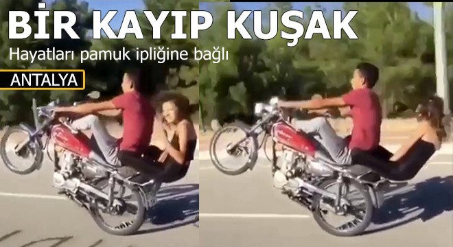 Motosikletle tek teker üzerinde tehlikeli yolculuk