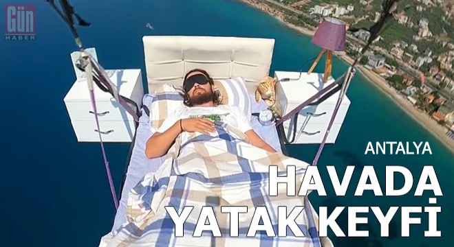 Paraşüt pilotu havada yatak keyfi yaptı